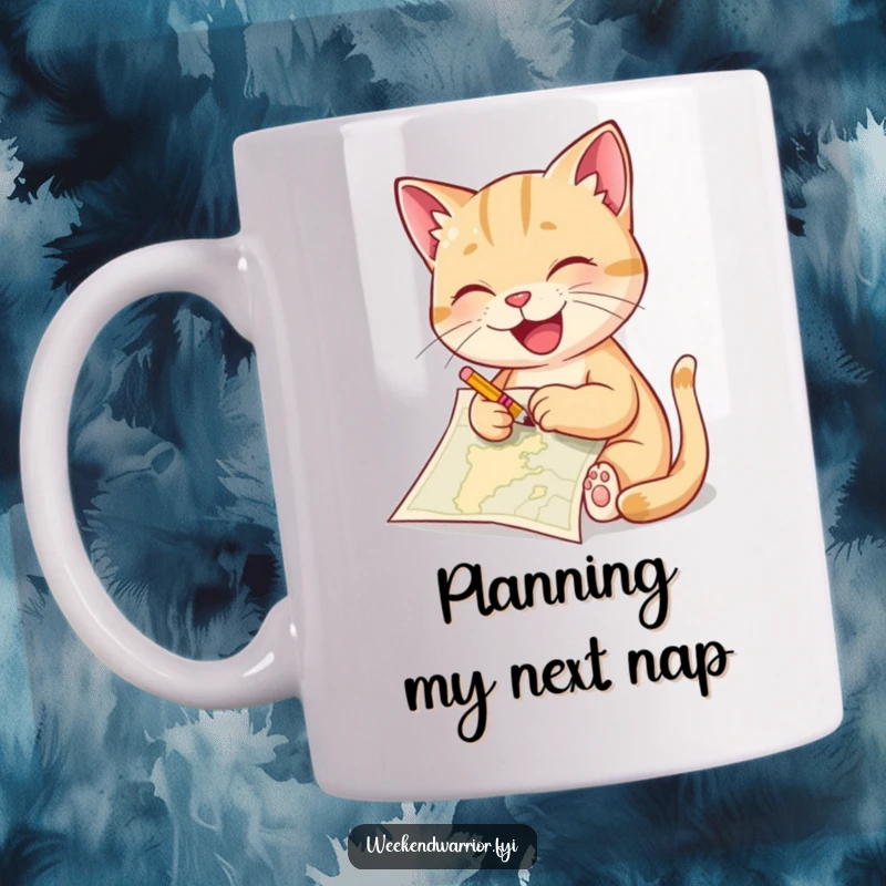 Funny cat mug showing a delighted feline artist sketching a map with a tiny pencil, showcasing creativity and artistic passion.