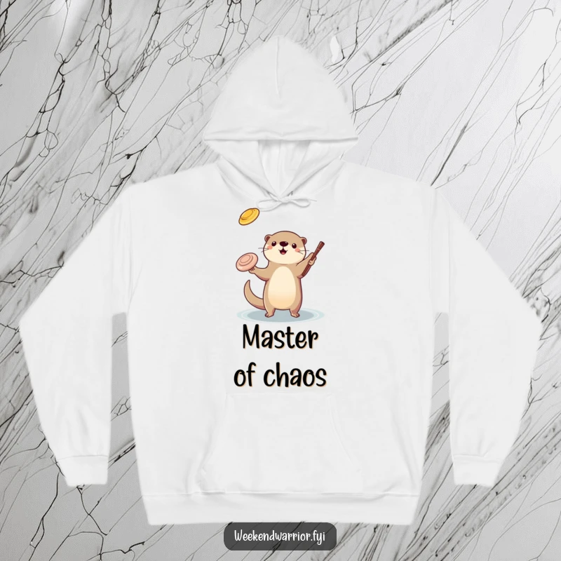 Funny otter juggling hoodie showing a playful otter in the act of juggling a frisbee and a stick, full of concentration and fun.