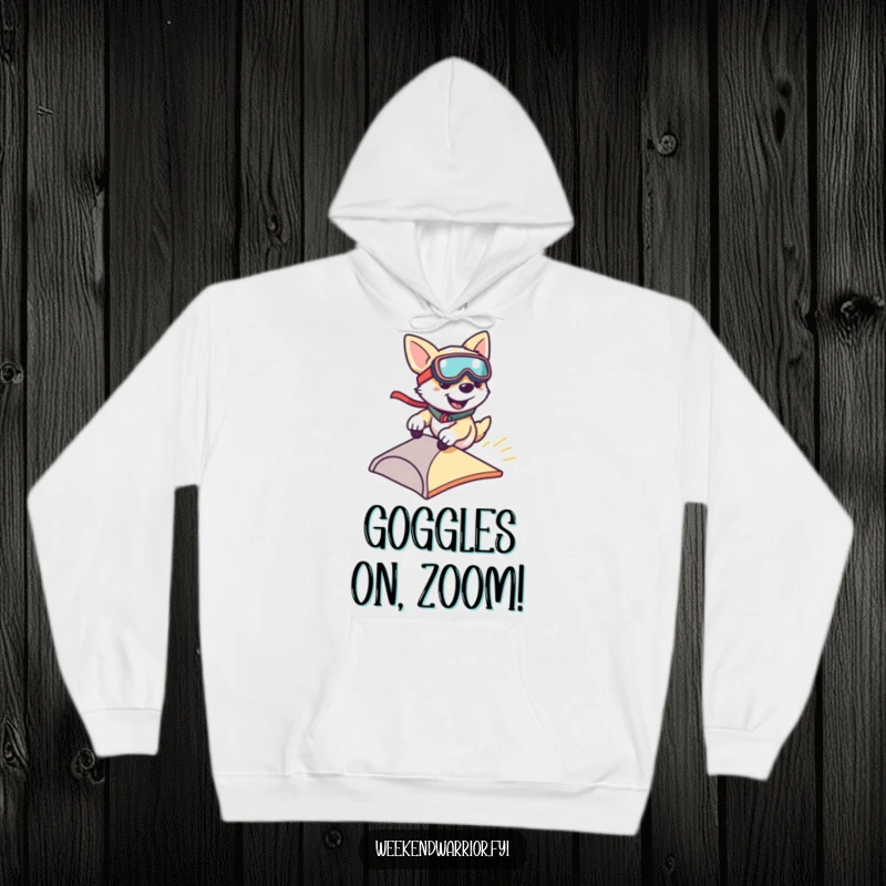 Funny hoodie graphic of a smiling dog wearing goggles, zipping down a small ramp at high speed, full of joy.