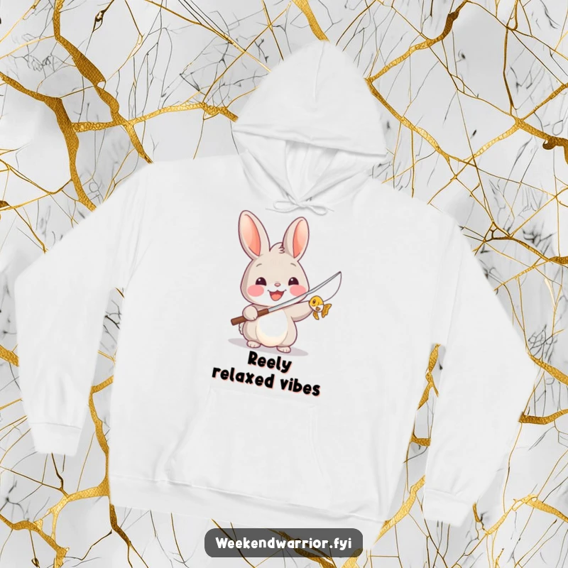 Funny hoodie featuring a smiling rabbit holding a fishing rod triumphantly with a tiny fish, perfect for cozy fishing adventures.