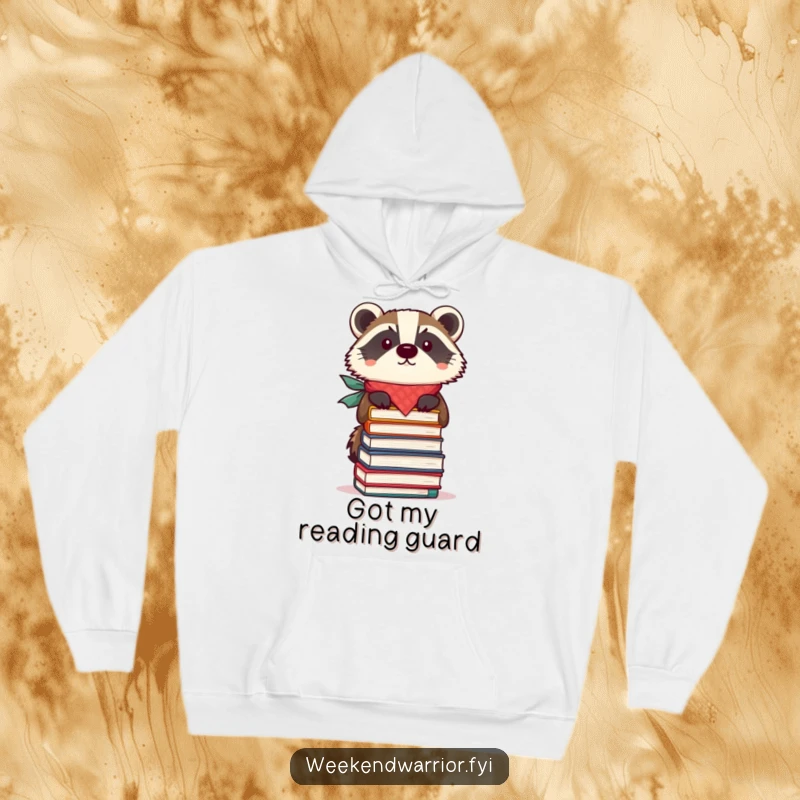 Funny hoodie featuring a badger wearing a bandana, skillfully balancing a stack of books, representing focus and learning.