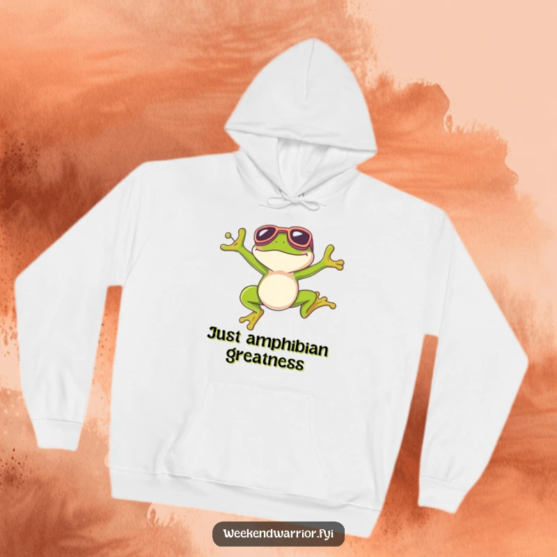 Funny hoodie showcasing a triumphant frog in goggles, celebrating a perfect jump with a wide smile.