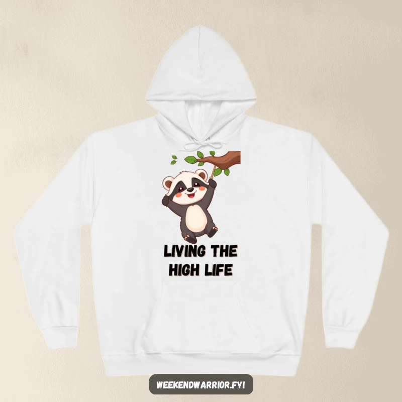 Funny hoodie featuring a cheerful badger character swinging from a tree branch rope, embodying joy and adventure.