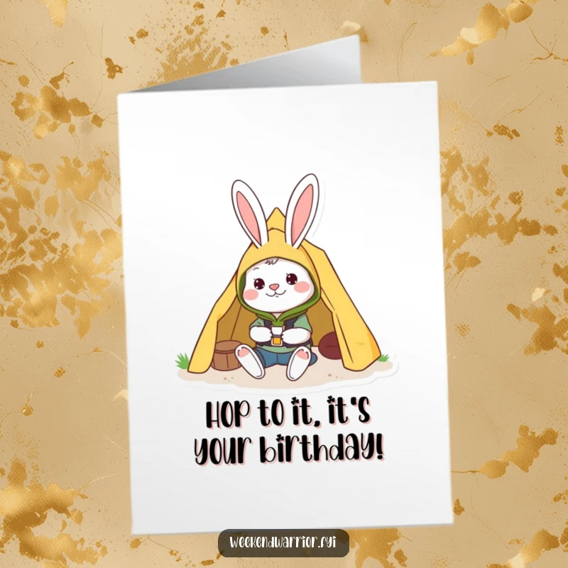 Funny free printable birthday card featuring a cheerful rabbit in camping gear busily setting up a tent, ready for a party.