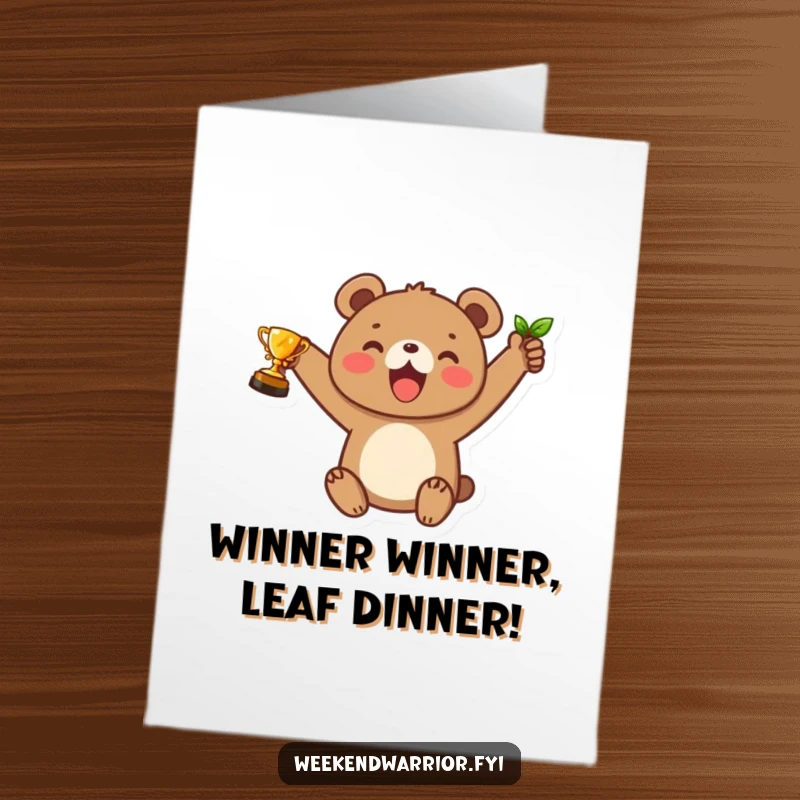 Funny Free Printable Congratulations Card: Adorable bear cub triumphantly holding a leaf trophy, celebrating success.