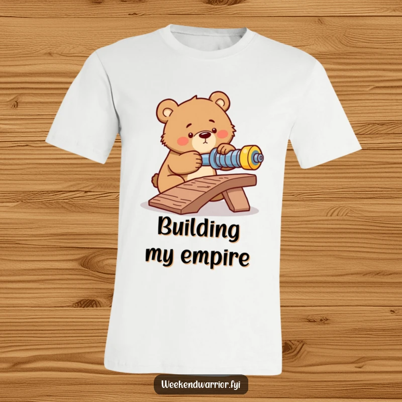 Funny t-shirt featuring a determined bear concentrating on tightening a bolt on a makeshift ramp, showing intense effort.