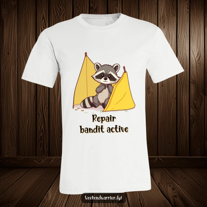 Funny Repair Raccoon T-Shirt with a brave raccoon diligently patching a small tear in a tent, ideal for casual wear.